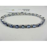Oval sapphire and diamond link bracelet stamped 750