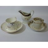 18th/early 19th century Derby coffee can and saucer, similar tea bowl and saucer,