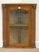 20th century oak corner display cabinet enclosed by single lead glazed door, W67cm,