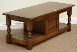 Old Charm medium oak two tier coffee table, centre linenfold cupboard,