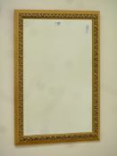 Gilt framed bevel edged rectangular mirror,