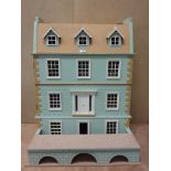 Large four storey dolls house with contents of furniture H100cm