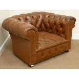20th century vintage Chesterfield oversized armchair upholstered in antique tan leather,