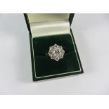 Diamond cluster ring, brilliant cut centre stone of approx 0.