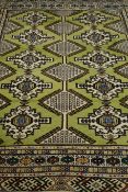 Turkoman green ground rug,