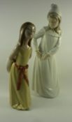 Lladro figure of a girl with a hat H25cm and a Nao figure of a girl with a torn nightdress H31cm