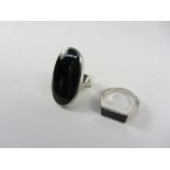 Two silver rings set with Whitby jet stamped 925