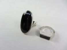 Two silver rings set with Whitby jet stamped 925