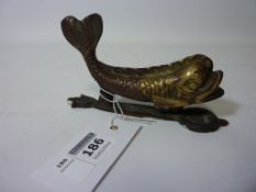 Early 20th century cast brass door knocker modelled as a dolphin H14cm