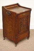 Edwardian oak coal compendium fitted with carved panelled fall front door, W37cm, H64cm,