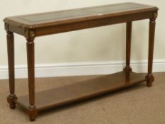 Reproduction mahogany two tier console table with two section glass top, fluted leg detail,