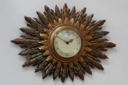 Smiths retro sunburst wall clock, W68cm,