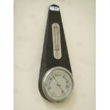 1950's metal cased aneroid barometer with thermometer,