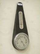 1950's metal cased aneroid barometer with thermometer,