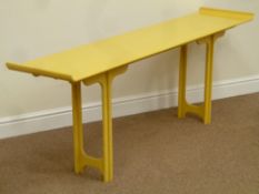 Three 20th century yellow painted benches in a Chinese altar style, L181cm, H65cm,