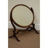 Edwardian mahogany oval dressing table mirror fitted with bevelled glass,