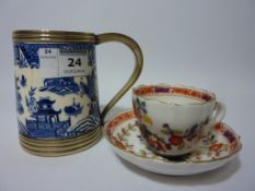 Mid 19th century Meissen cabinet cup and saucer and a Worcester Willow Pattern tankard with silver