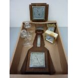 Two aneroid barometers,