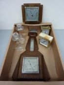 Two aneroid barometers,