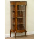 Early 20th century French kingwood bowfront glazed display cabinet enclosed by single door,