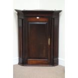 19th century oak wall hanging corner cabinet, enclosed by single panelled door,