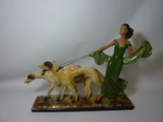 Art Deco period chalk figure - woman walking with pair of  Borzoi dogs L54cm