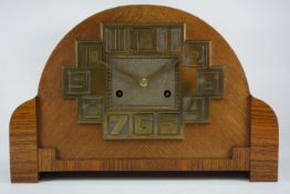 Art Deco style oak and rosewood cased clock fitted with brass dial, H23cm,