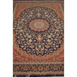 Red and blue ground Keshan carpet,