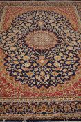 Red and blue ground Keshan carpet,