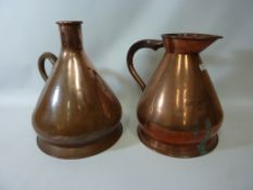 Two 19th century copper flagons H37cm and 32cm