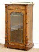Late Victorian inlaid figured walnut music cabinet enclosed by single glazed door fitted with
