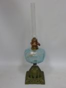 Early 20th century oil lamp with cast iron base H54cm