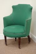 Late Victorian tub shaped upholstered chair with shaped back,