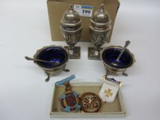 Pair of Edwardian silver peppers by Mappin and Webb Birmingham 1900 and a pair of silver salts and