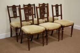 Six Edwardian walnut dining chairs, fretwork back splat with carved detail,