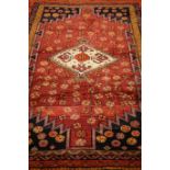 Persian Shiraz red ground rug,