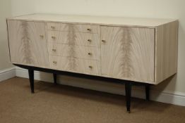 Berry Furniture 'Designs in Melamine' bleached mahogany finish sideboard fitted with four centre