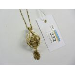 Italian gold egg shaped open work pendant and chain by Gobi Prezziozi Arrezo stamped 750 approx 12.