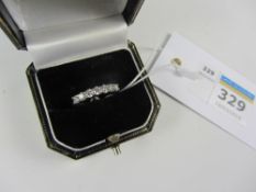 Seven stone diamond ring on platinum band