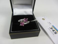 Princess cut pink tourmaline cross-over ring hallmarked 18ct