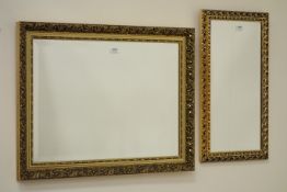 Rectangular bevel edged mirror in ornate gilt frame (82cm x 62cm),