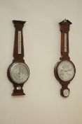 20th century oak cased aneroid barometer with thermometer and another mahogany finish barometer