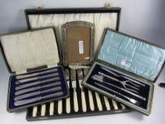 Silver photograph frame, set of tea knives with hallmarked silver handles,