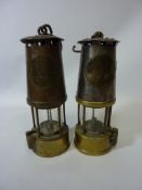 Two 'The Protector' miners lamps by the Lamp & Lighting Co. Ltd.