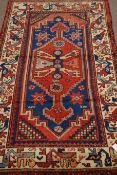 Persian Hamadan red, blue and beige ground rug,