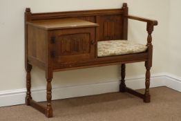 Reproduction oak linenfold telephone table fitted with single cupboard, W94cm, H78cm,