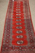 Pakistani Bokhara red ground runner rug, gules pattern,