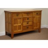 Yorkshire Oak - 'Acornman' adzed oak sideboard, fitted with six drawers and two cupboards,