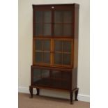 Edwardian mahogany three tier library bookcase enclosed by glazed doors, W93cm, H185cm,