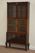 Edwardian mahogany three tier library bookcase enclosed by glazed doors, W93cm, H185cm,